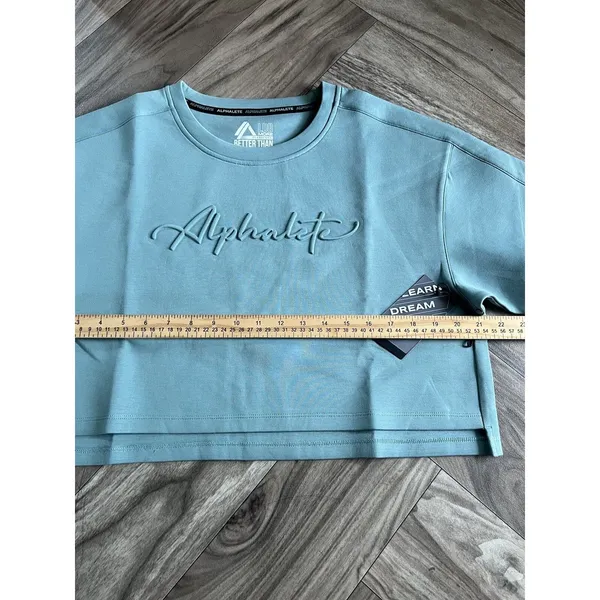 Set 2 Pcs Alphalete Women's ELMTS Short Sleeve Crop & Relaxed Coffed Jogger Teal - Image 12