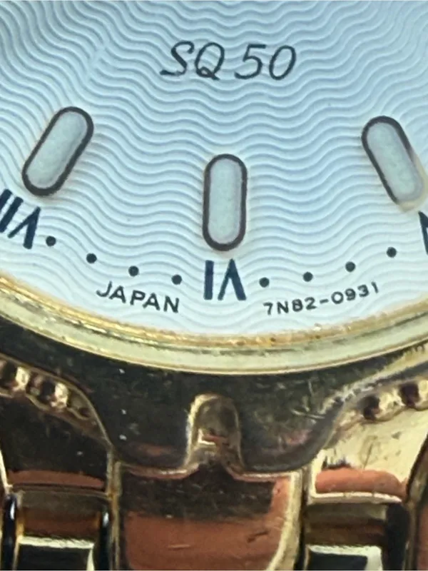 Seiko Vintage Watch Gold Bracelet Case White Dial Blue Gold Hands Date Window - Image 8