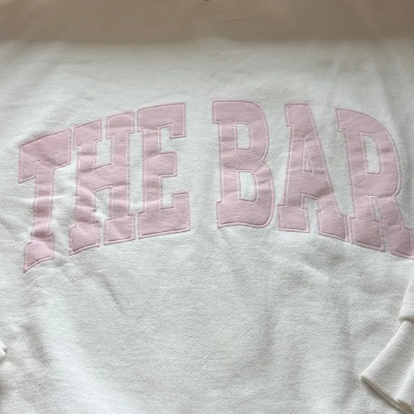 The Bar White Sweatshirt with Pink Lettering - Image 4
