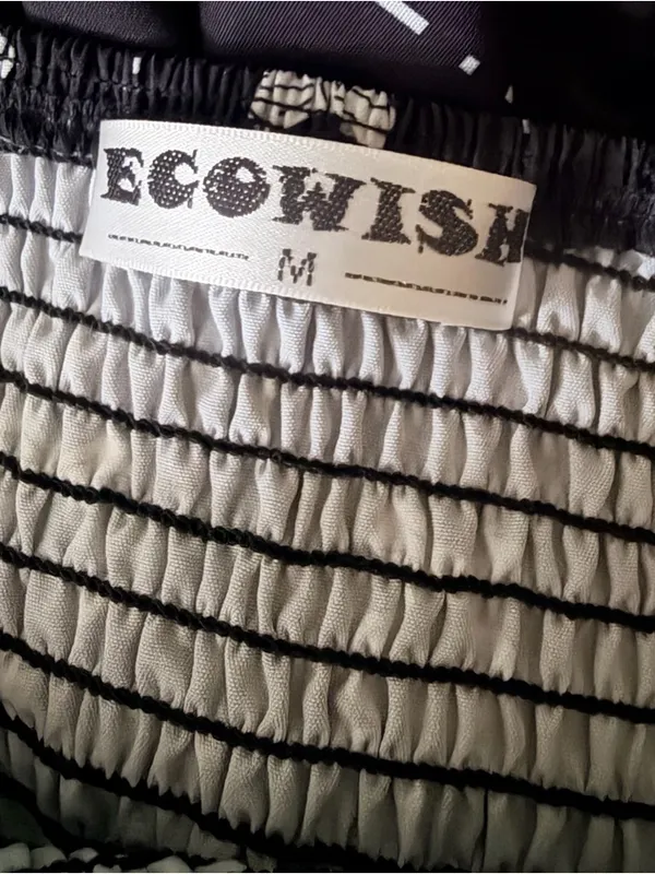 Ecowish Wish Black and White Smocked Dress with Bow Accent - Image 4