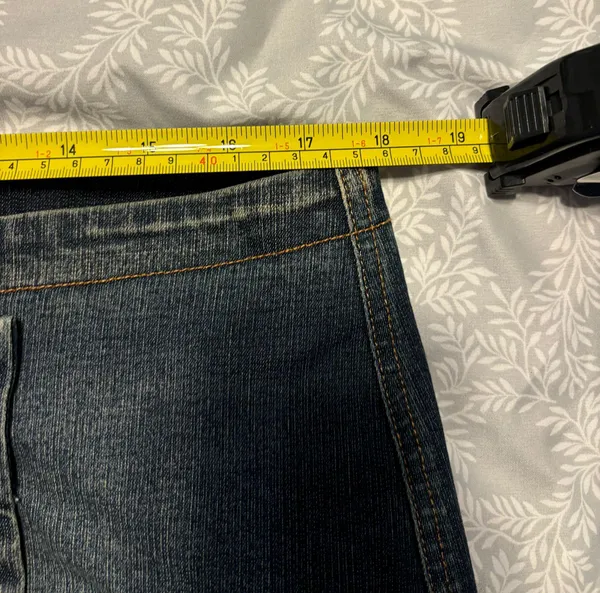 Urban Outfitters mini asymmetrical denim skirt with button closure - Image 7
