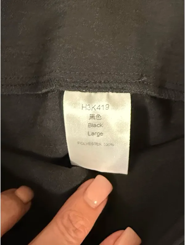 High-Waist Wide-Leg Black Pants with Button Detail - Image 4
