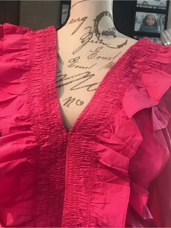 Feminine Ruffled V-Neck Peplum Blouse in Hot Pink - Image 9
