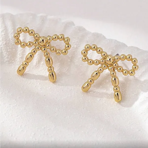 Chic Gold Bow Earrings - Image 3