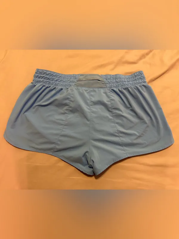 Nike DRI-FIT Women’s Light Blue Athletic Shorts - Image 2