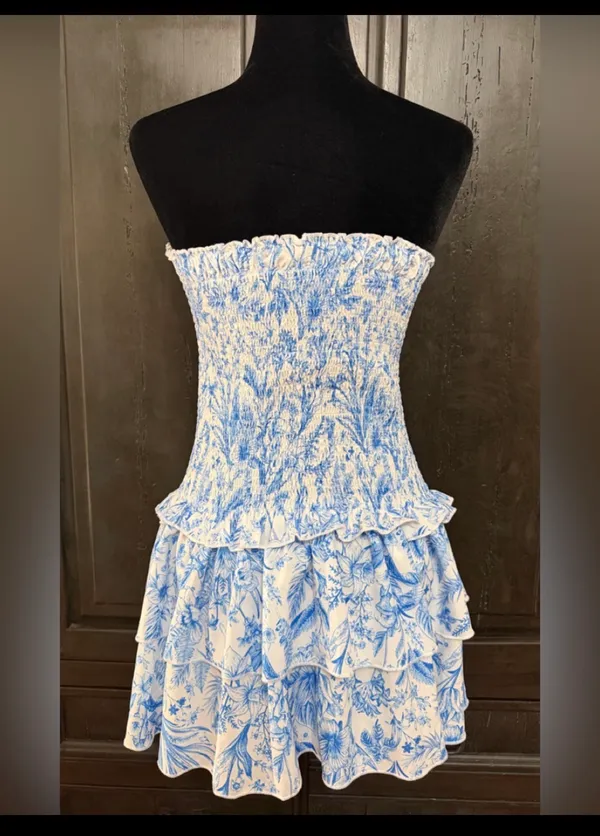 SHEIN Blue & White Floral Print Double Ruffle Hem Strapless Tube Dress -Size Med. Tiered Layer Ruffle Hem Tube Dress Sleeveless Tube Dress. Wear to a vacation, summer, spring outing, date night or party event. Super cute, gently warn & excellent condition. Measurements approximately 15” from armpit to armpit not fully stretched out from elastic x 25” long. Non-smoking home. Priced to sell at as is condition. Don’t like my price, make reasonable offer! - Image 2