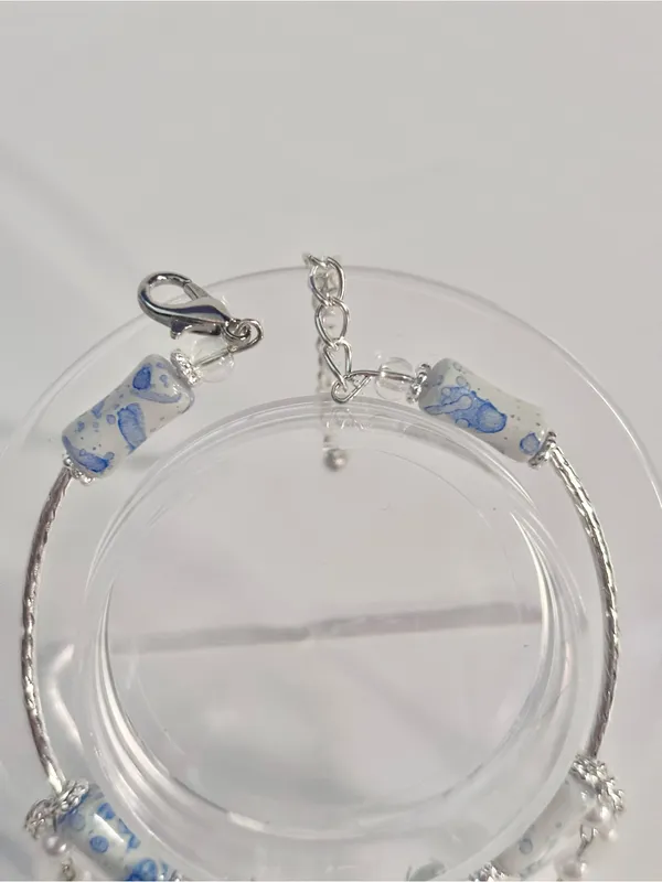 Handmade Hand Crafted Silver Bracelet with Blue and White Beads and Mermaid Tail Charm - Image 3