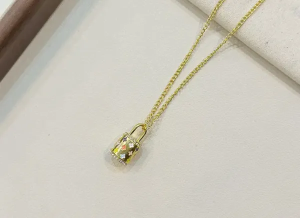Elegant Gold Necklace with Colorful Pendant - Image 2