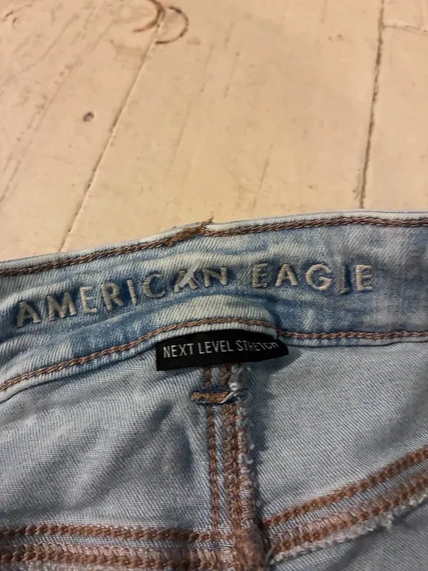 American Eagle Super High-Rise Light-Wash Flare Jeans - Image 3