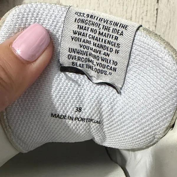 33.9 The Original White and Black Women's Sneakers - Image 11