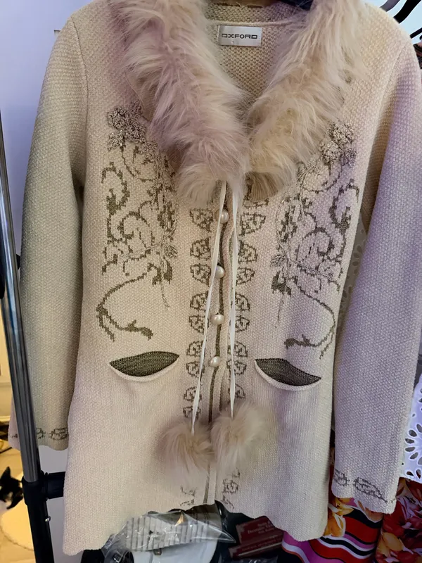 Long cream sweater with chauffeur around collar and cute fur pom-pom ties - Image 2