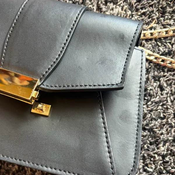 Elegant Black Leather Bag with Gold Accents - Image 2