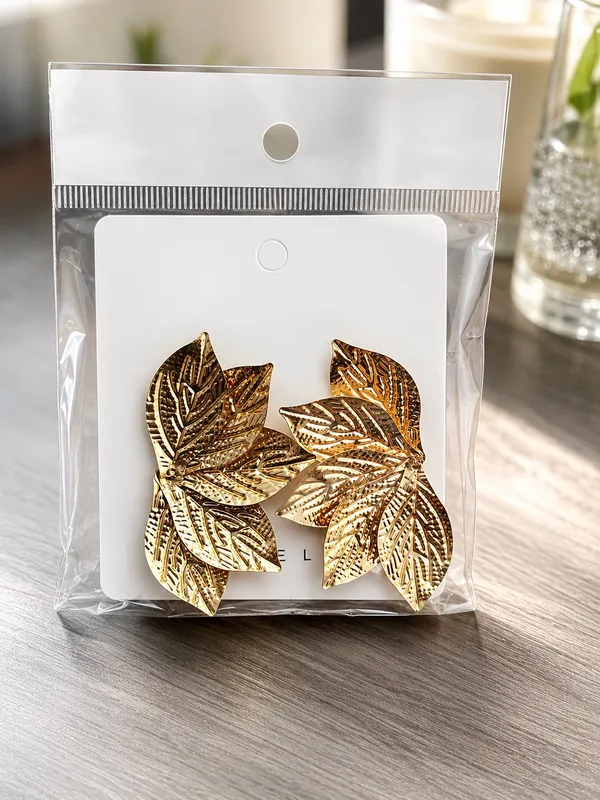 This elegant heart necklace is made from 18k gold-plated stainless steel and features a large central cubic zirconia stone surrounded by smaller crystal accents. - Image 4
