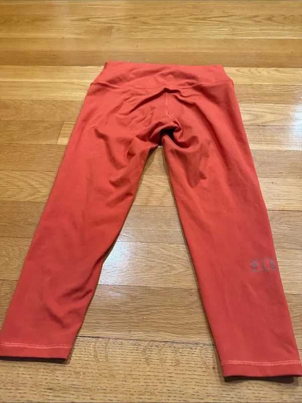Fleo orange leggings size large . - Image 8