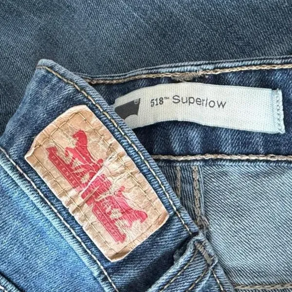 Levi’s 518 Superlow Rise flare jeans in a waist size 27 - Image 5