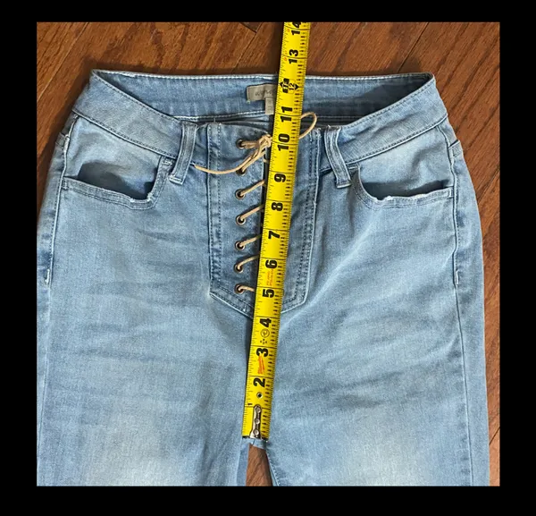 Wonderly Urban Cowboy Light Wash High Rise Boot Cut Jeans With Tie Closure. gently warn& are in excellent condition. measurements approximately 13” waste x 10” rise x 42” long. Non smoking home. priced to sell at as is condition. Don’t like my price, make reasonable offer! And thank you for checking my closet. - Image 8