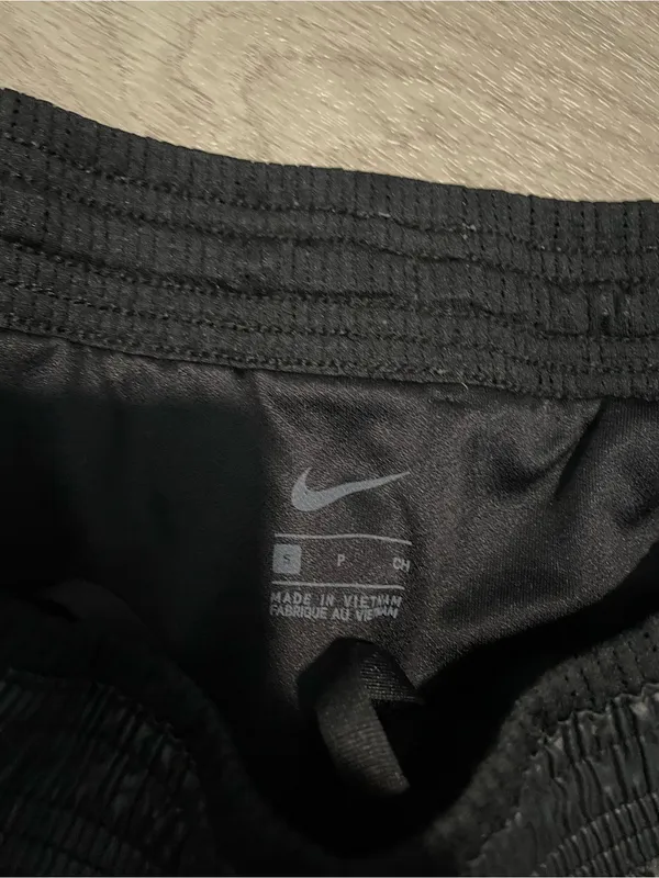 Nike Black Women’s Athletic Shorts with White Swoosh - Image 2