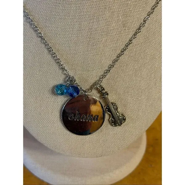 “Ohana" accompanied by musical instrument blue crystal charms Necklace (7433) - Image 2