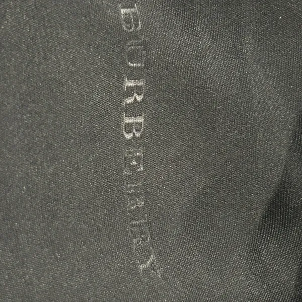 Burberry Black Case with Gold Logo includes Burberry cleaning cloth. - Image 3