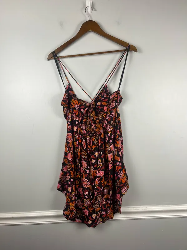 New Free People Women's Black Pixie Cross Back Floral Print Tunic Top Size large - Image 10