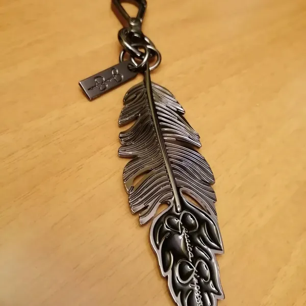 Jessica Simpson Pewter Solid Feather Color Keychain Bag Charm, Luggage Charm - Image 2
