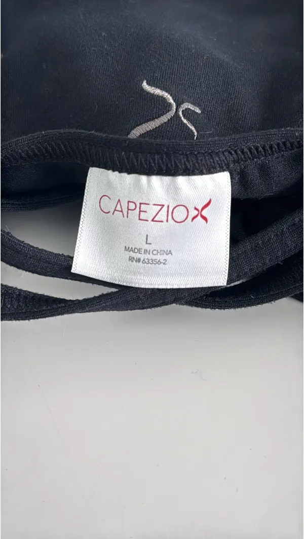 Capezio black tank top with cut out design on back. Size large child - Image 5