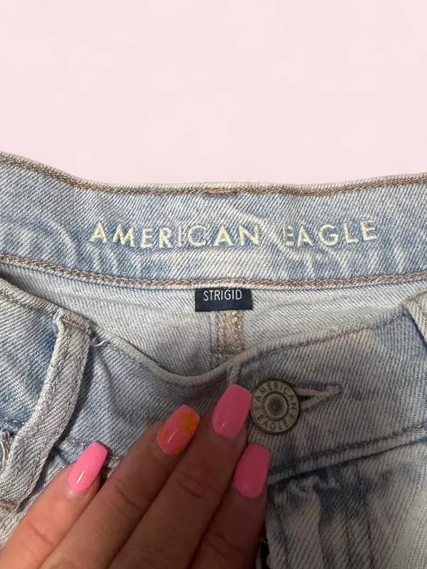 American Eagle Outfitters Light Wash Distressed Denim Cutoff Shorts - Image 2