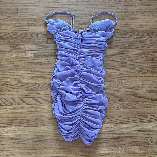 Mistress rocks purple dress - Image 3