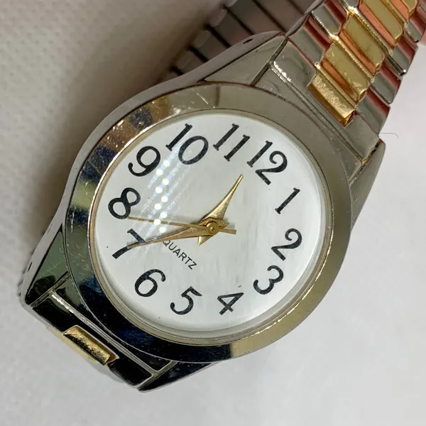 Women’s quartz analog watch gold silver tone 28mm stretch band 6.5” running - Image 2