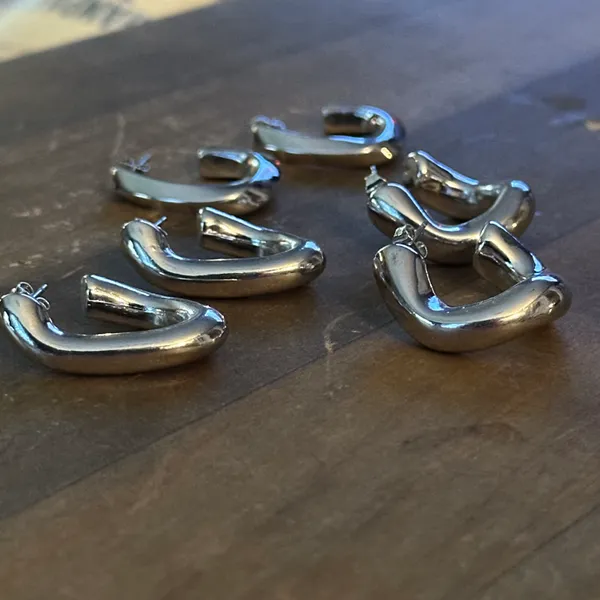 Set of three silver tone chunky link hoop earrings - Image 2