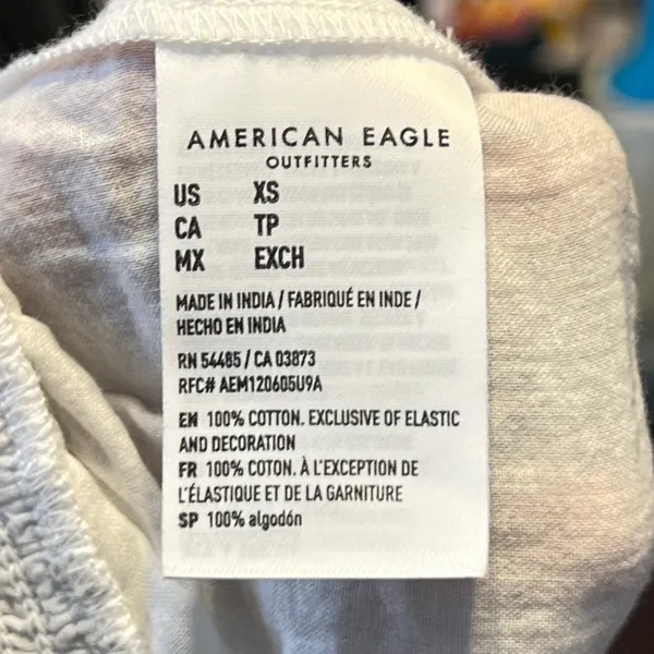 772 | NWT American‎ Eagle Embroidered Smocked Peplum Tube Top White Blue XS - Image 7