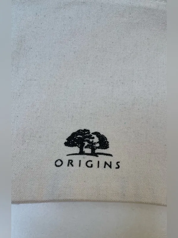 Origins Natural Canvas Wristlet with Orange Strap and Black Logo - Image 3
