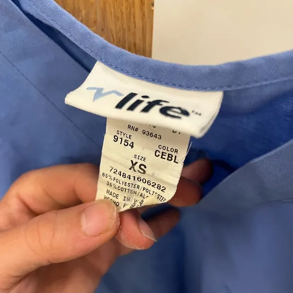 Light blue scrub top. Size XS - Image 3