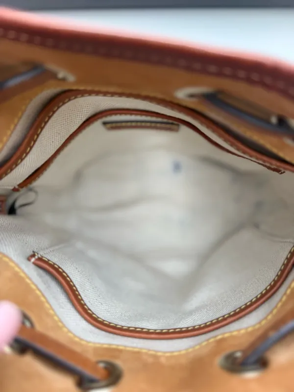 Dooney & Bourke Gretta Small Drawstring Crossbody Bag in excellent condition - Image 5