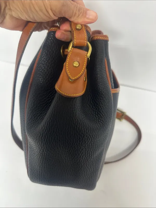 Dooney & Bourke Black Pebbled Leather Drawstring Bucket Bag with Tan Trim - Image 3
