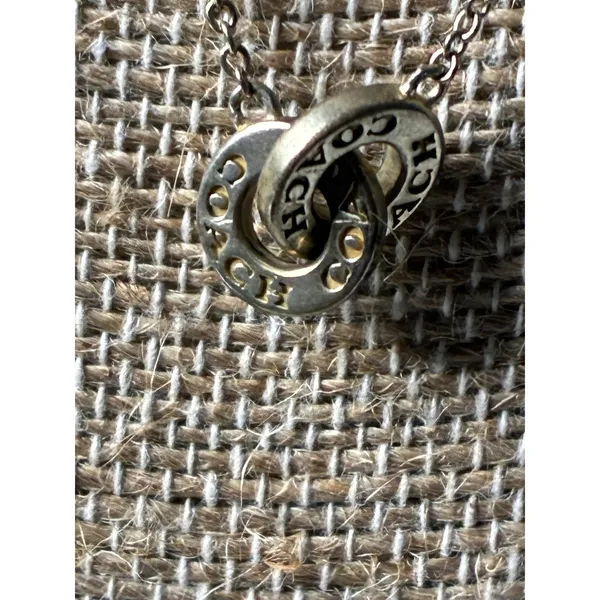 Coach Gold-Tone Interlocking Open Circle Pavé Crystal Pendant Necklace - Image 4