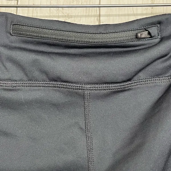 Nike Dri-Fit Black Cropped Mesh Bottom Drawstring Zip Pocket Stretch Leggings - Image 4
