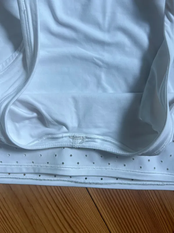Lululemon Cropped, All White Tank Top With Mesh Bottom - Image 4