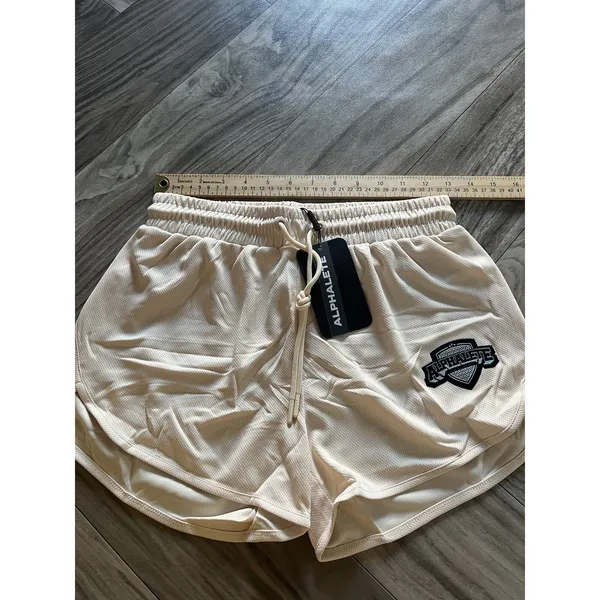 NEW Alphalete Woman’s Varsity Short - Tan ,size Medium - Image 10