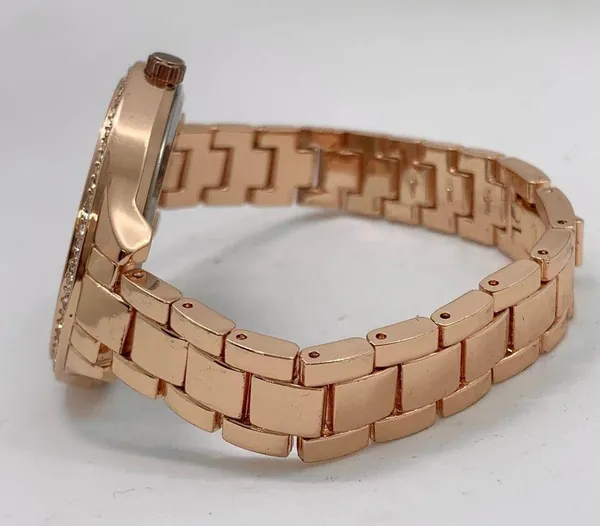 Ladies rose gold tone 40mm rhinestones MOP dial watch bracelet size 7.5” runs - Image 3