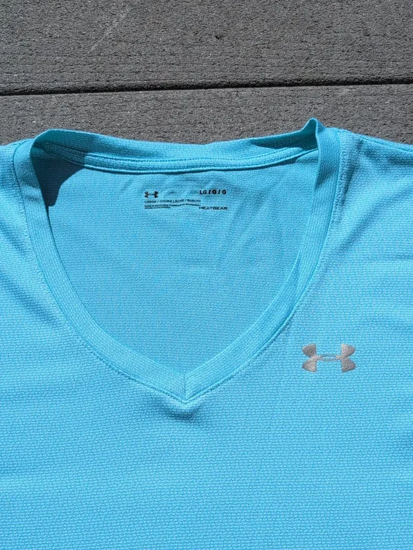 Under Armour Women's Loose Fit V-Neck Short Sleeve Shirt | Hear Gear - Image 2