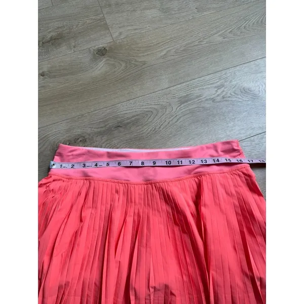 EUC Women Lululemon Pleat To Street Skirt II Grapefruit neon tennis skirt Size 8 - Image 7