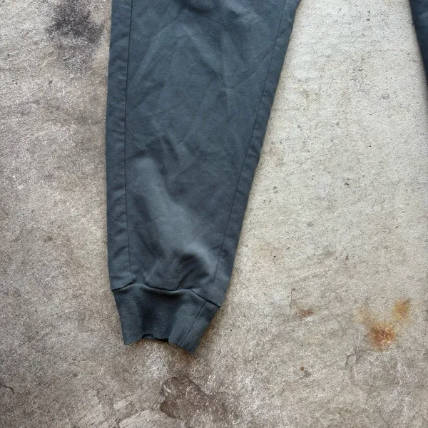 FIGS Zamora Jogger Scrub Pants in the limited-edition bonsai green colorway, featuring a comfortable yoga waistband and contrasting reddish drawstring - Image 2