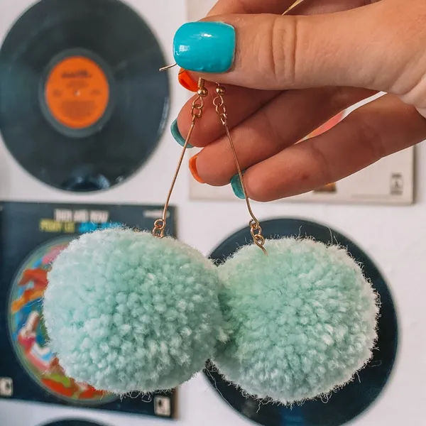 Light Teal Blue Pom Pom Earrings - Image 6