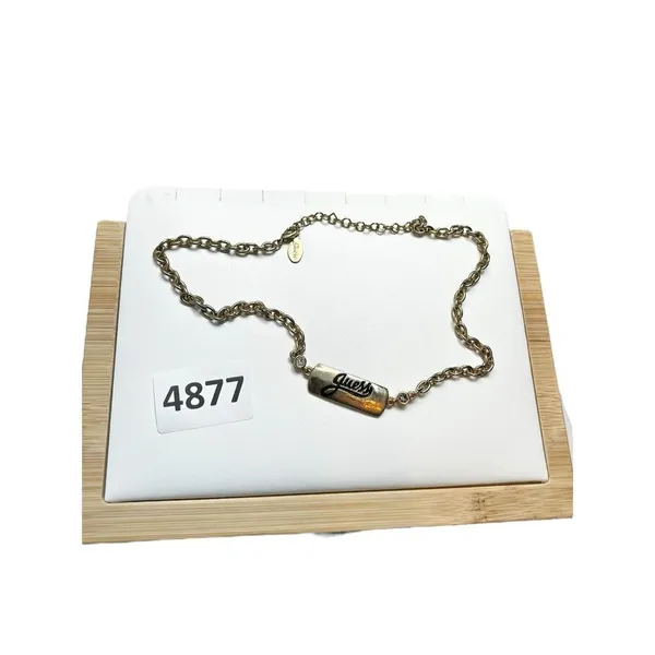Guess gold toned chain necklace with “guess” plated name plate - Image 5