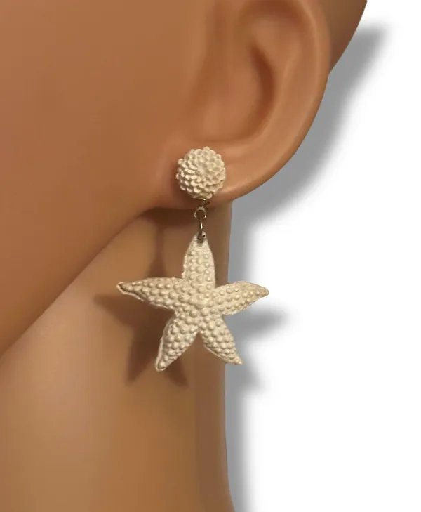 White resin starfish dangle post earrings - Image 2