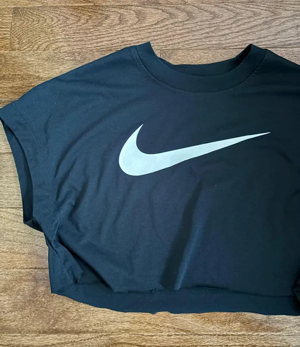 Nike women’s black cropped tee with white swoosh - Image 2