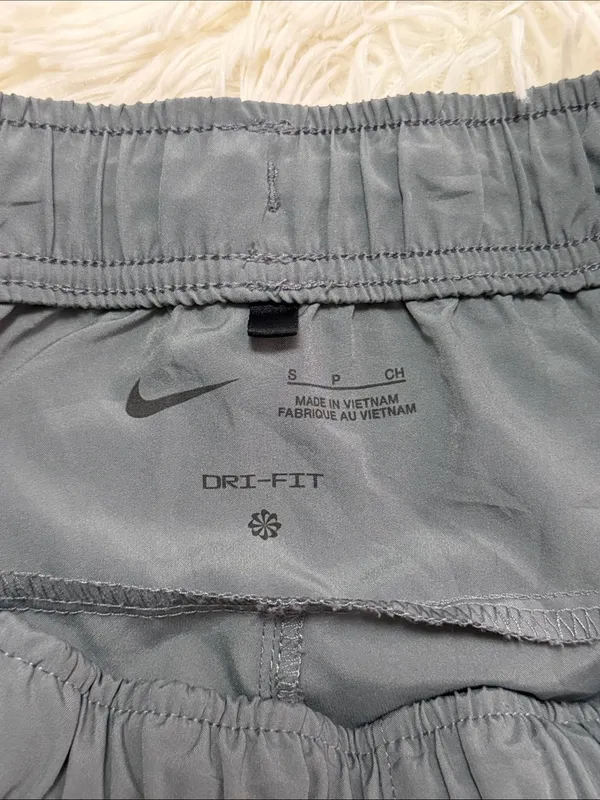 Nike Women's Charcoal Gray Track Joggers with Reflective Swoosh - Image 4