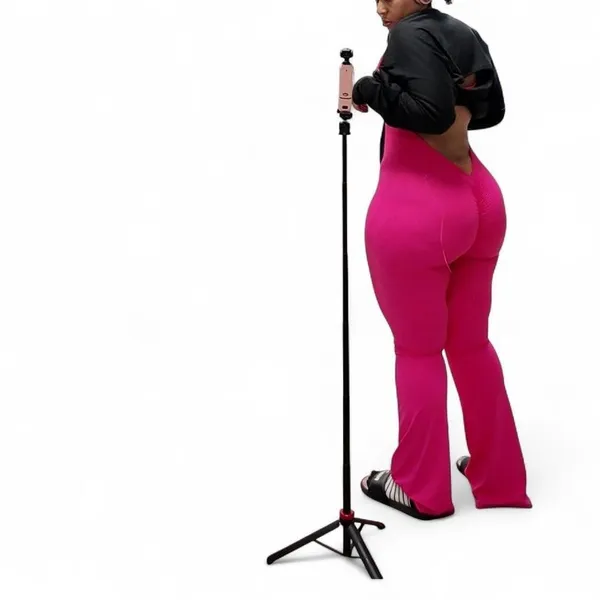 Pink flare jumpsuit with‎ stretchy fabric - Image 2