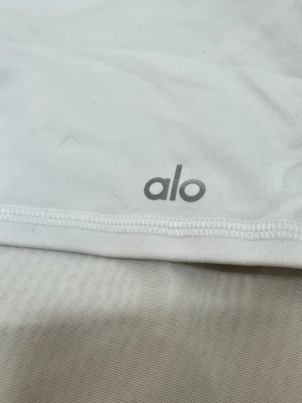 Alo High-Waist White Bike Shorts with Overlay - Image 4